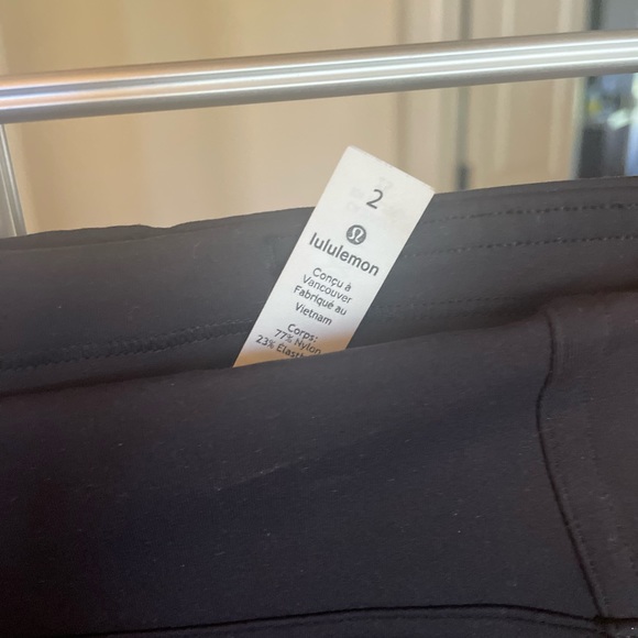 Lululemon black leggings with cutouts at knees. Size 2. No flaws. - Picture 2 of 4